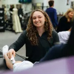 Athletic training student working on patient
