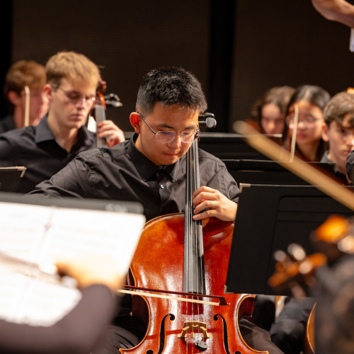 Students playing in orchestra